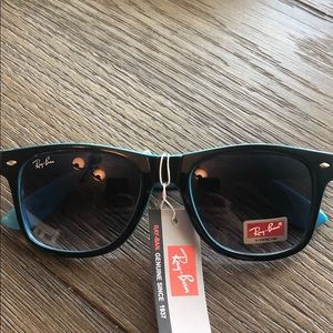 Ray-Ban sunglasses.